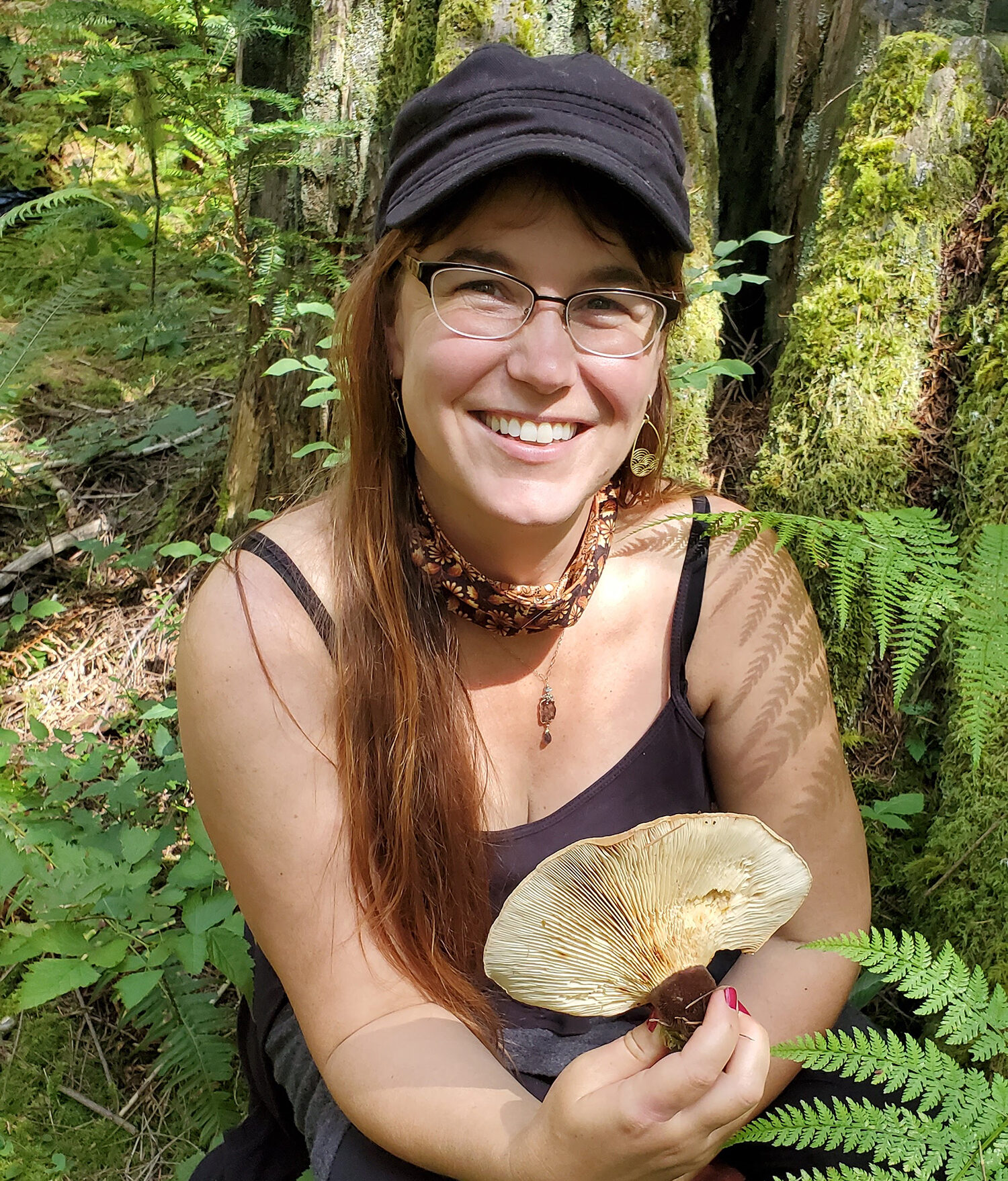 woman smiling with mushroom