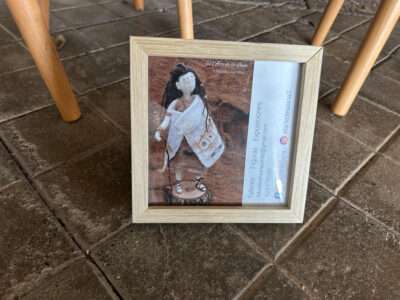 Felted doll from IFFS 2025 exhibit
