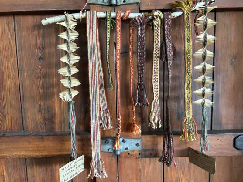 Tablet weaving samples from IFFS 2025 exhibit