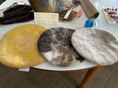 Berets from IFFS 2025 exhibit