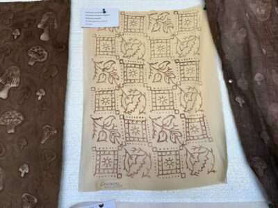 Wood block prints from IFFS 2025 exhibit